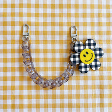 Load image into Gallery viewer, Checkered Smiley Flower Phone Case Chain